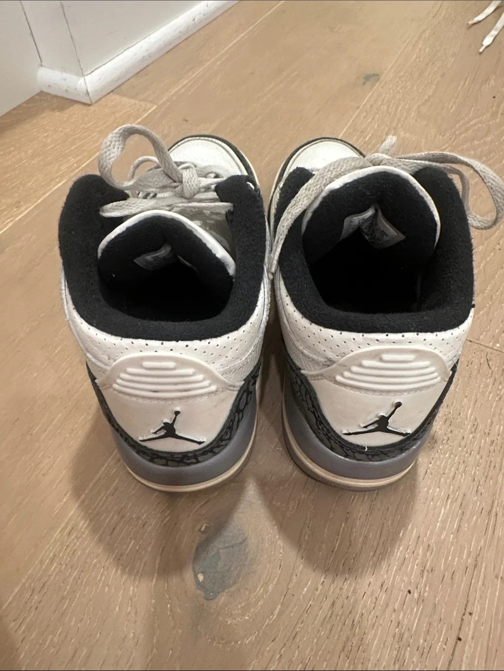 Nike Air Jordan Boy’s white/grey high top sneakers